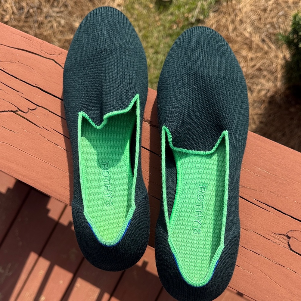 Rothy's Black Knit Slip-Ons with Bright Green Insole